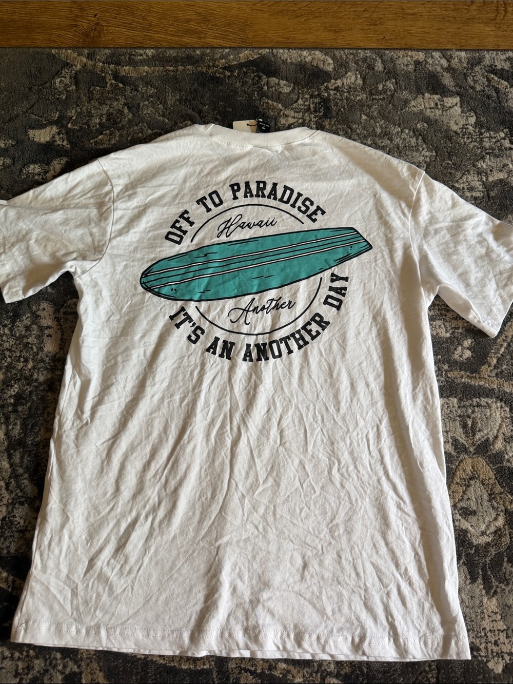 White Women’s Graphic Tee with Teal Surfboard - Off To Paradise Dazy girl size S